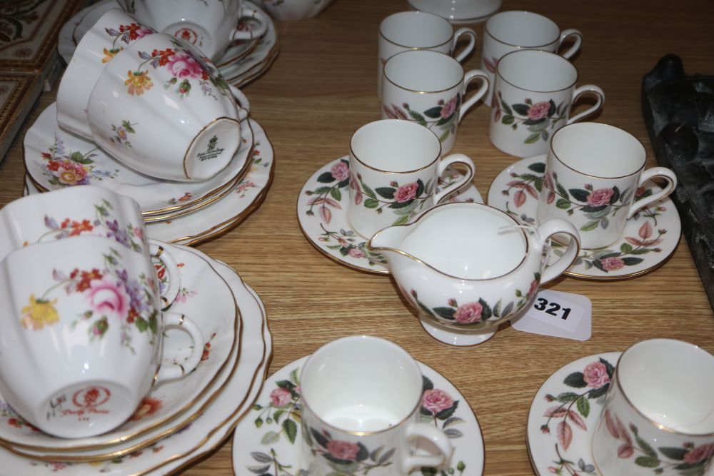 A Royal Crown Derby Derby Posies 25-piece part tea service and a Wedgwood Hathaway Rose part coffee service,